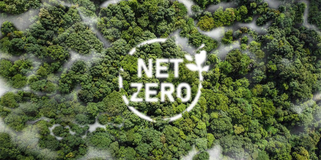 Net Zero Carbon Neutral and Net Zero Concept natural environment A climate-neutral long-term strategy greenhouse gas emissions targets A cloud of mist in the green Net Zero figure.